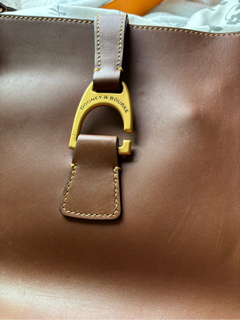 Dooney & Bourke Brown Leather Messenger with Gold Hardware Accent